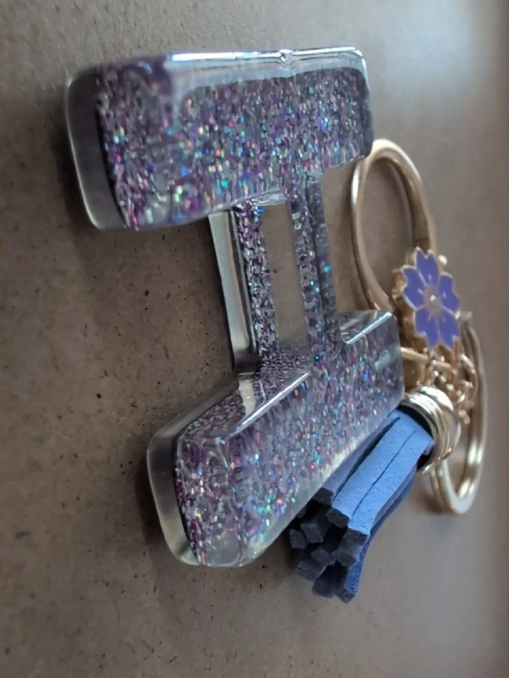 Glitter Purple 'H' Letter Keychain with Tassel and Flower Charm